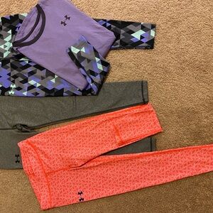 Lot of under Armour pants, long sleeve shirt and sports bra